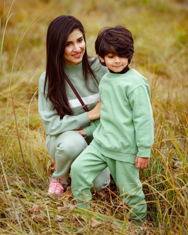 Abeera Wahab plays with her son.